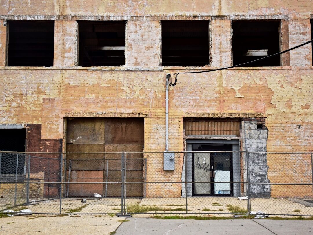 Abandoned building facade with peeling paint